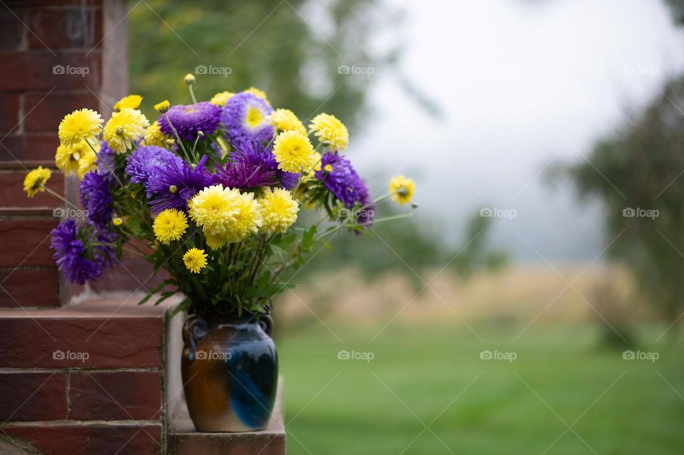 Bouquet of blue and yellow autumn flowers