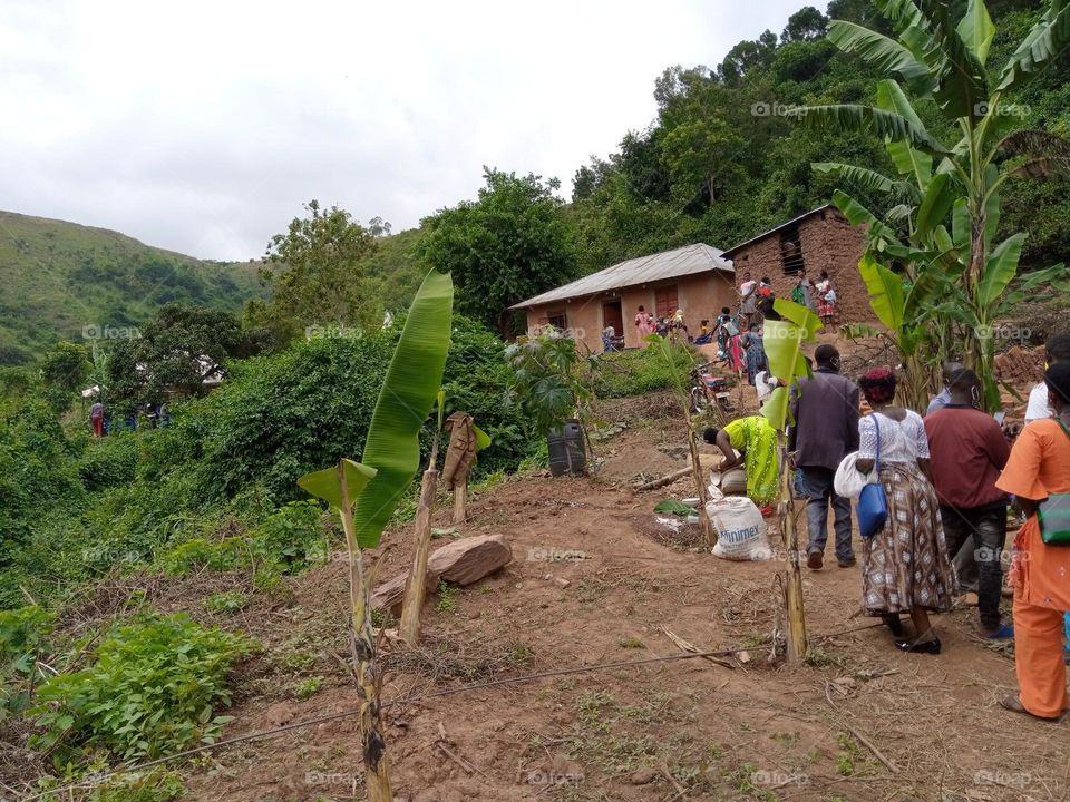 attending to a burial celemony in Isingiro district Western Uganda Africa