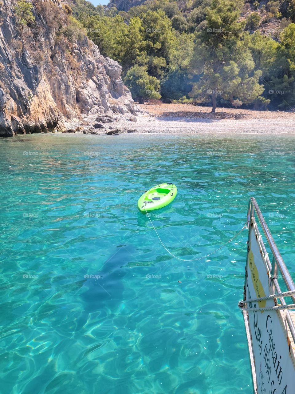 Kayaking in crystal clear Mediterranean turqoise sea