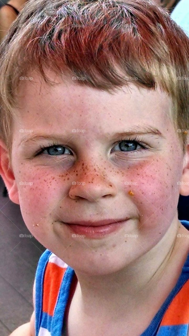 Portrait of a boy with freckles