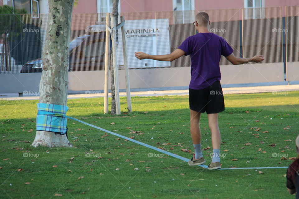 tightrope walker. saturday afternoon walk in Lisbon