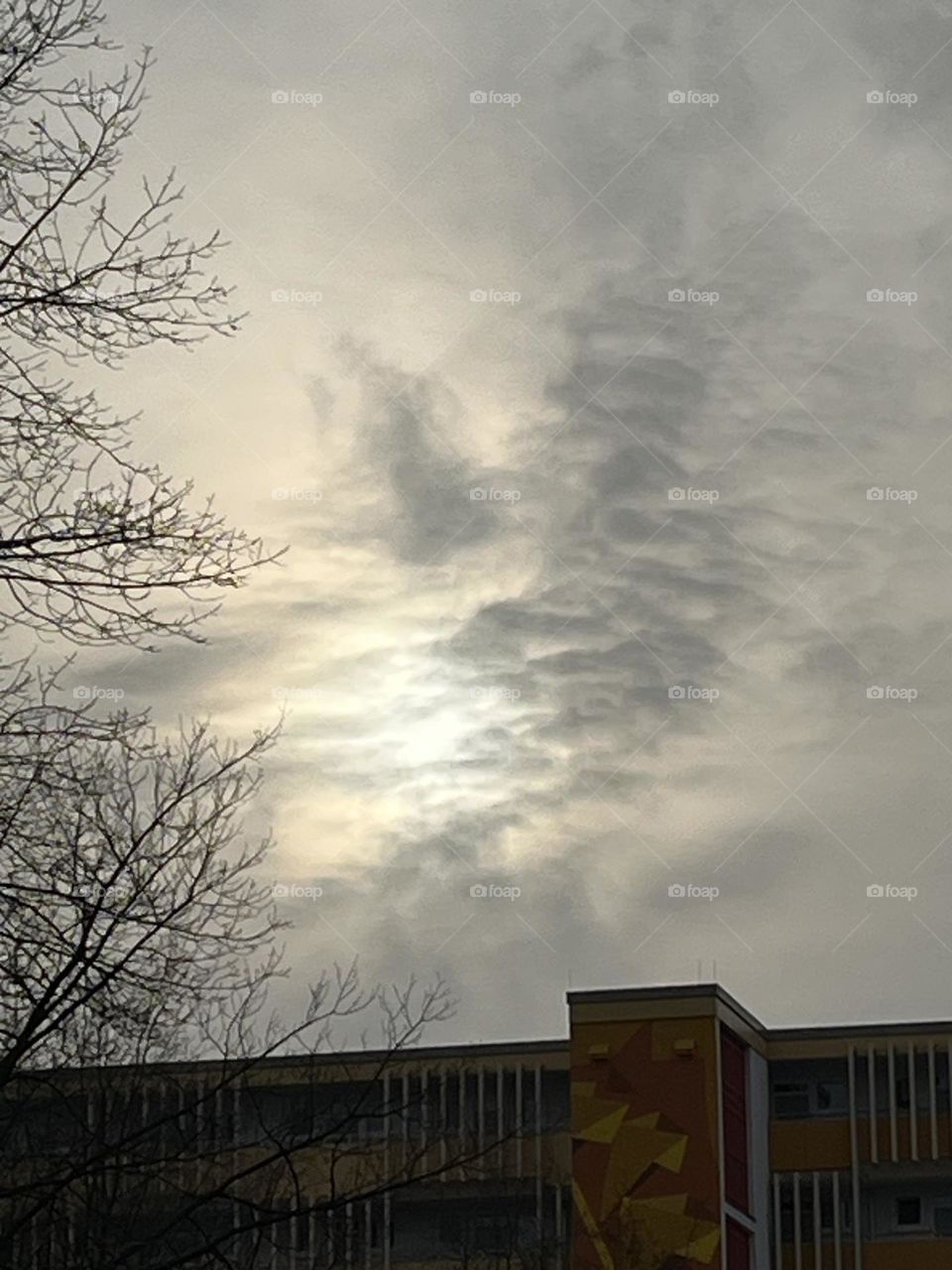 wonderful cloud spectacle with the sun behind them