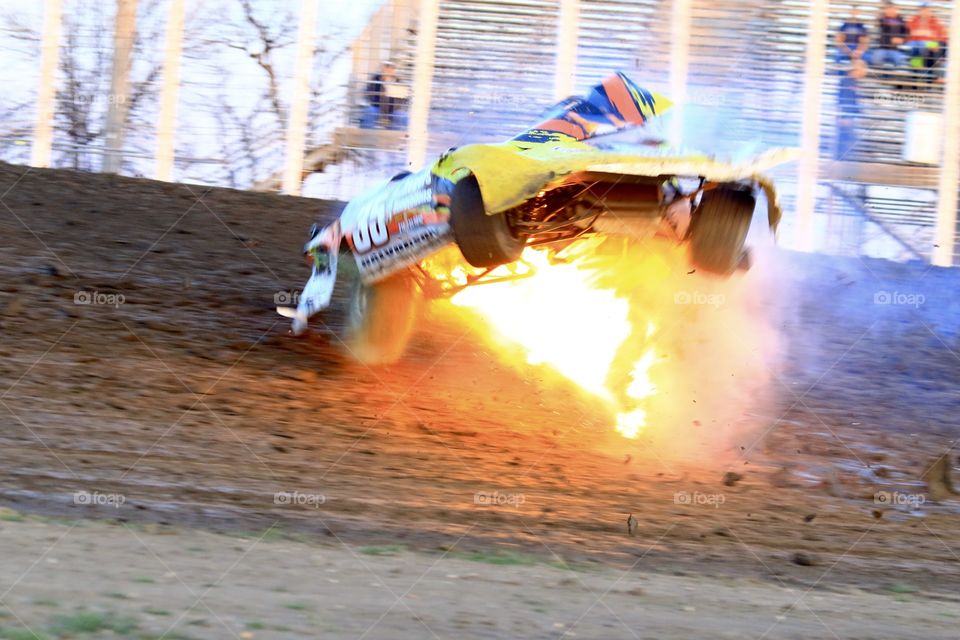 Race Car Crash Action Photo and it catches fire 