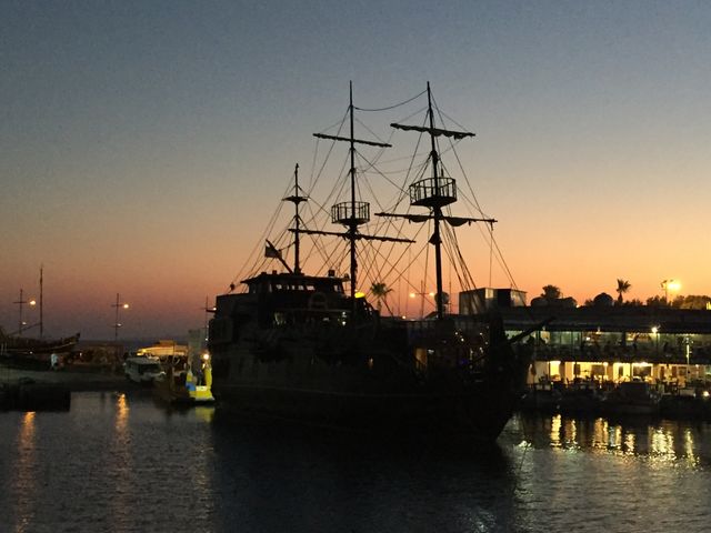 Ship docked at sunset 