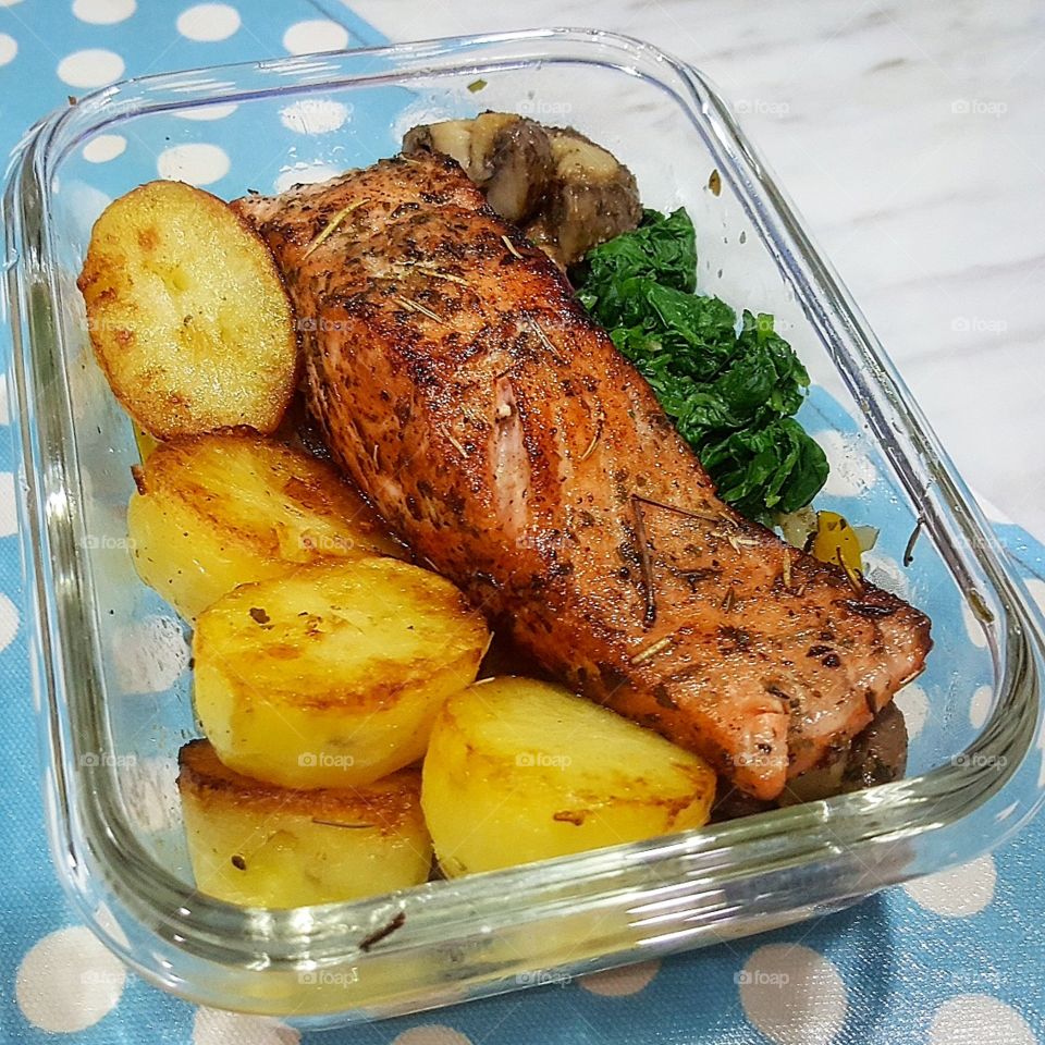 Wifey's lunchbox, pan fried salmon with kale, sauteed mushrooms, onion, pepper & roast butter herbs potatoes.