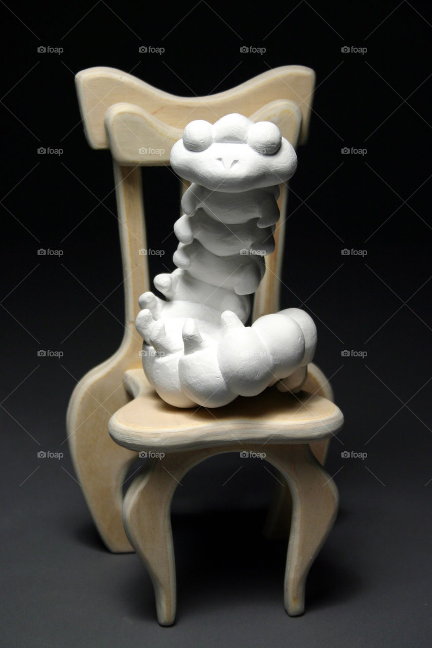 Student sculpture called "Sit Centipede. Sit"