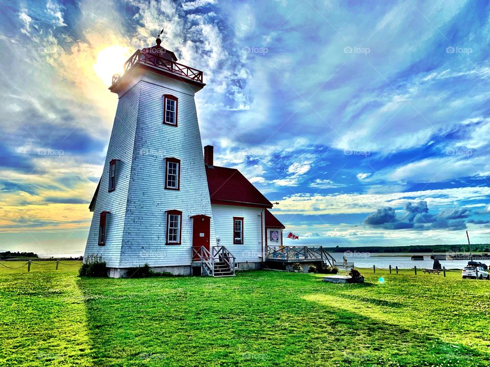  Beautiful woods island lighthouse in Prince Edward Island Canada on a beautiful summer day with a beautiful sky