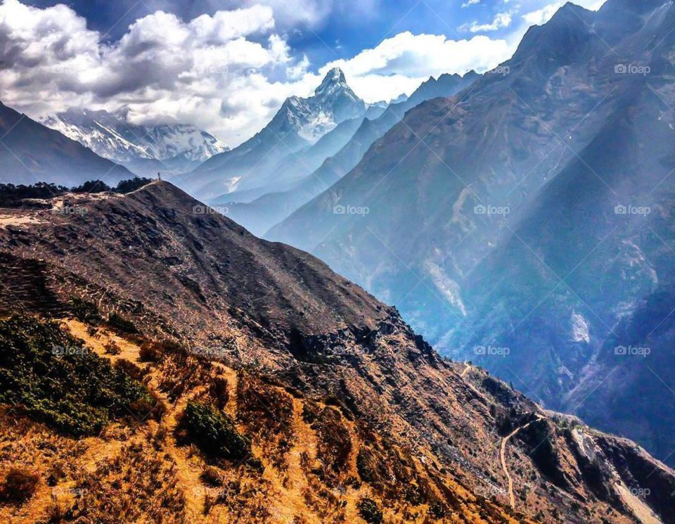 Looking down the Khumbu Valley between Namche Bazaar and Tengboche. Mt. Everest, Lhotse and Ama Dablam are all in view. Photo taken on the Everest Base Camp Trek in Nepal.