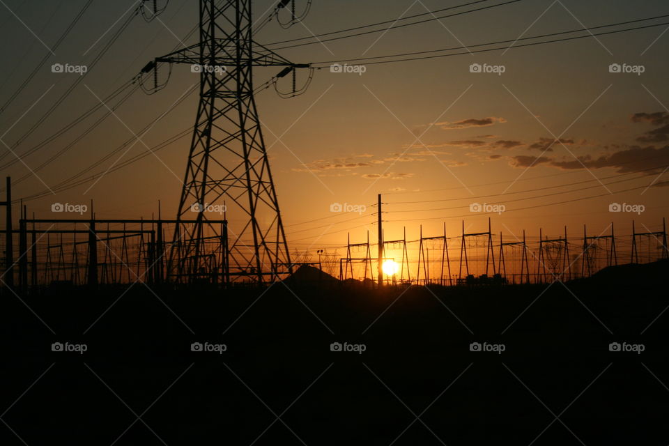 Silhouette of electricity pylon