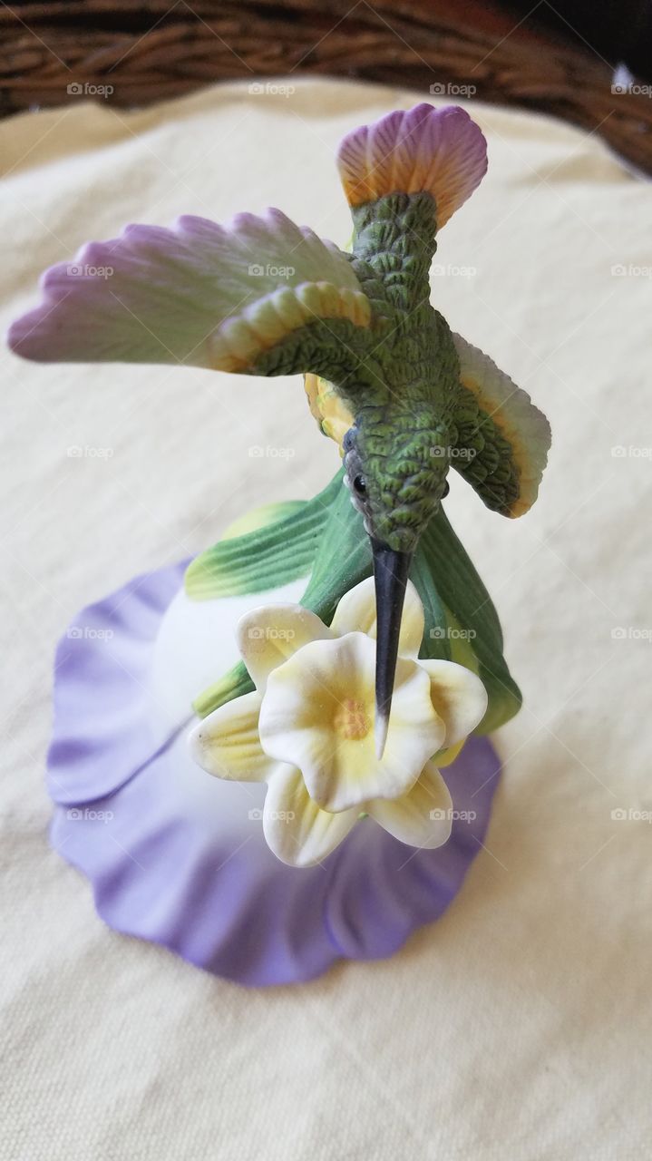 Hummingbird bell ceramic figurine