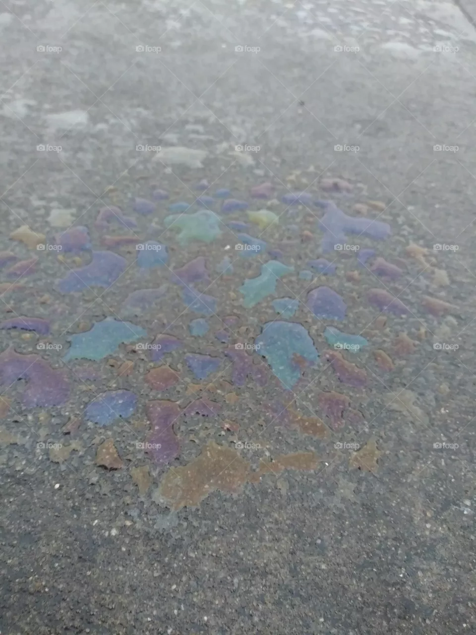 Rainbow oil on concrete 
