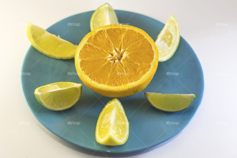 Orange with lemons and limes