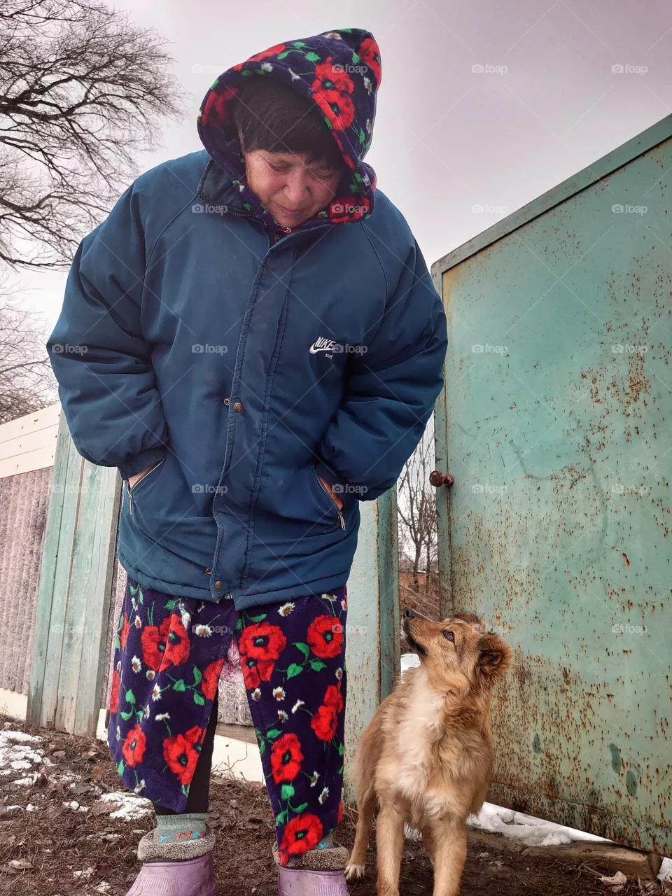 Unaudited photo, granny and her little guard - dog