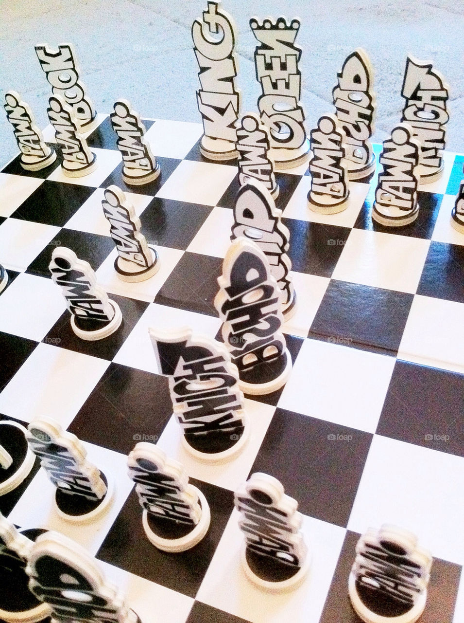 white black game board by king