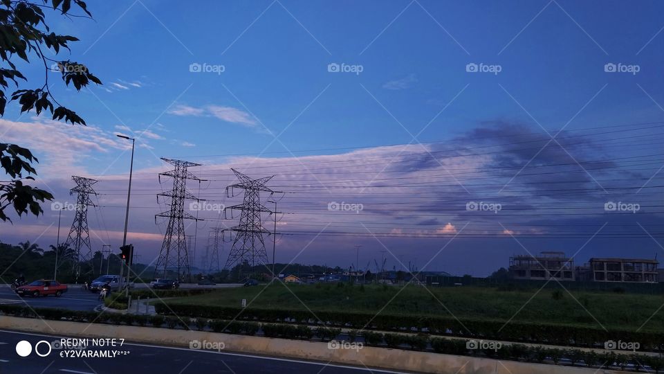Cloud backdrop of power cable