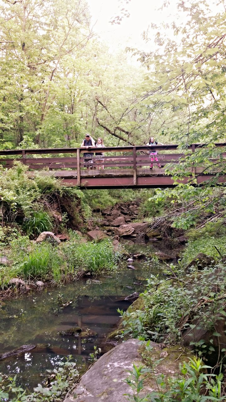 crossing the bridge. Devils Lake trails