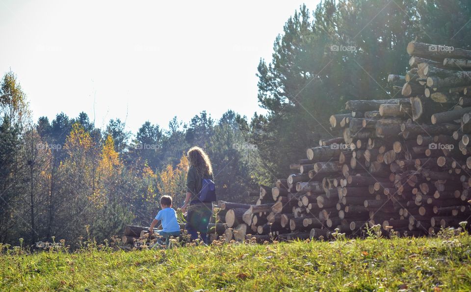 family walking outside, nature landscape, social distance