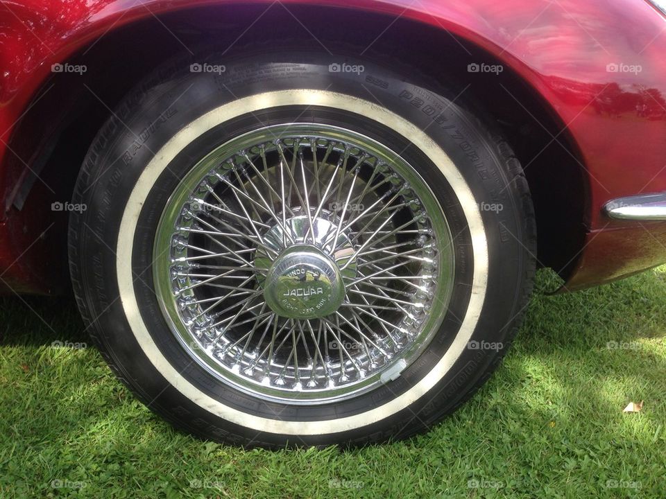 Jaguar E-Type chrome wire wheel.