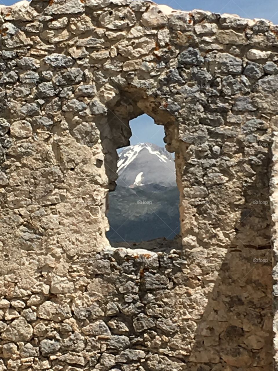 View through a window of the mountains