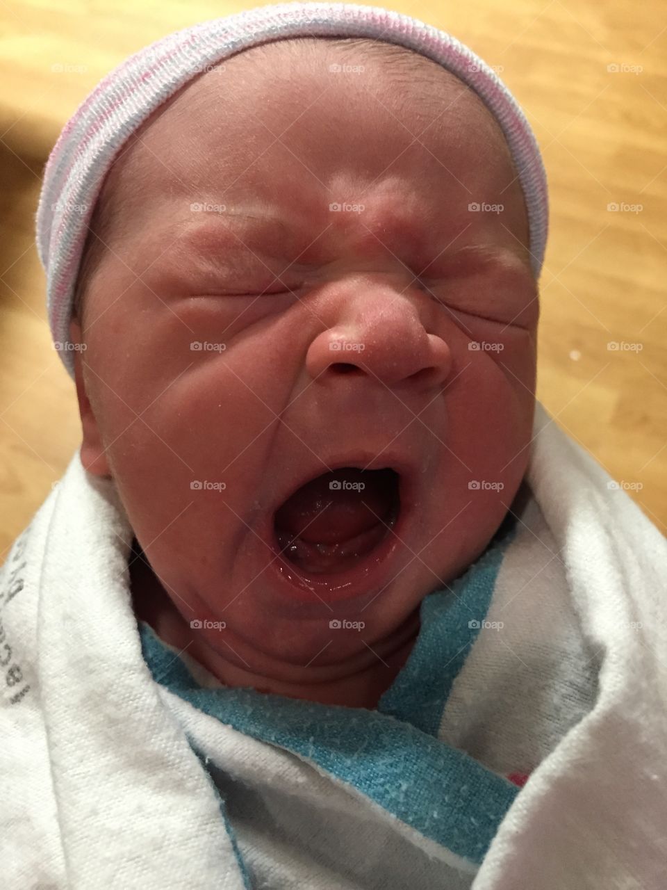 First Yawn. A baby's big yawn, after her first bit of "hard labor"