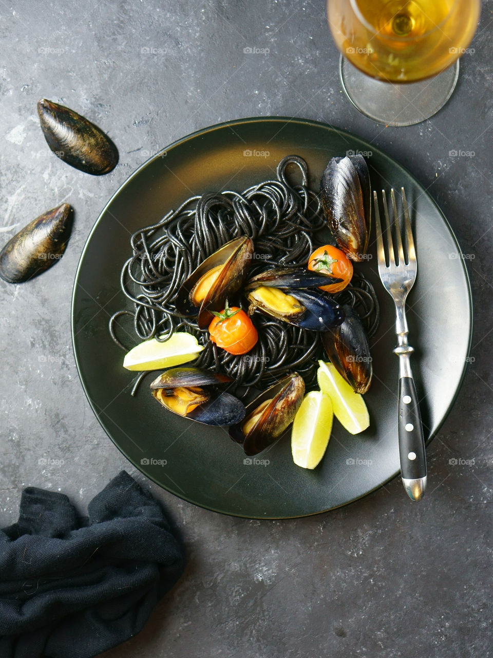 
Close-up of mussels and noodles served in plate