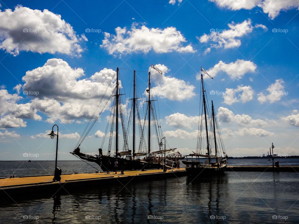 Boat moored at pier