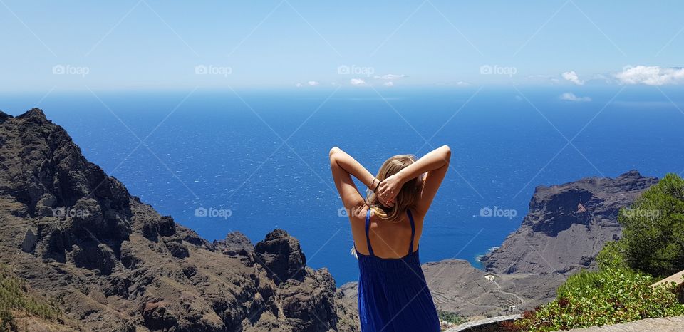 woman on the top of mountain on la gomera canary island in Spain - top view