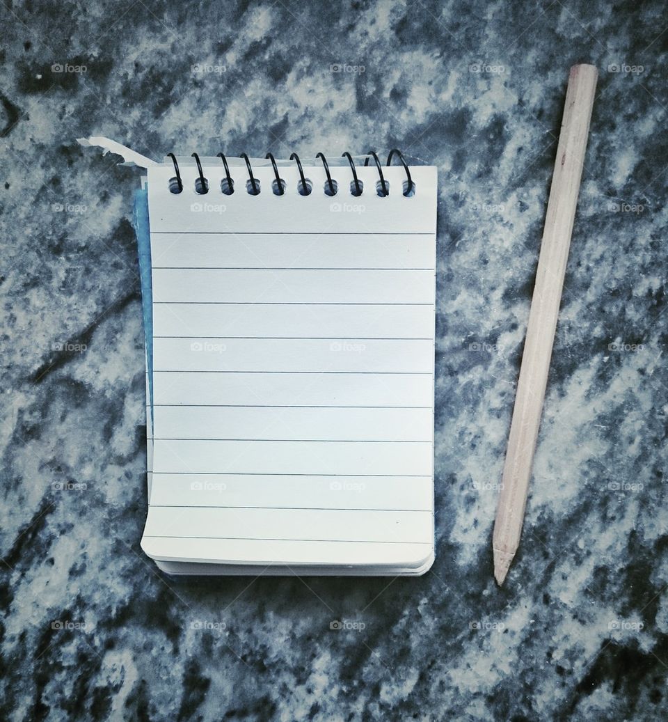 Notebook and pencil 