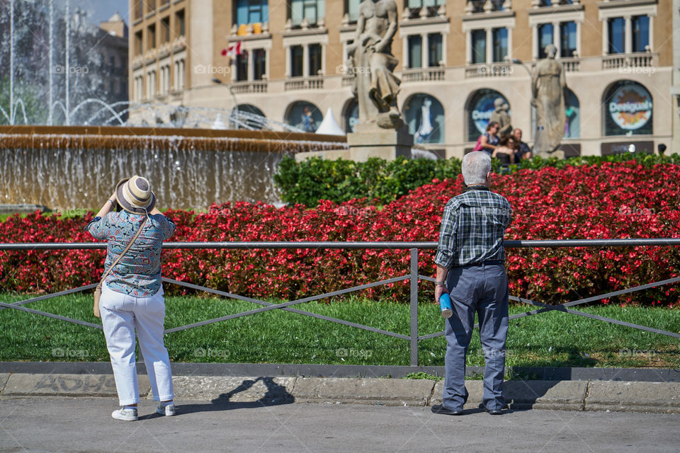 Elderly tourists couple in Barcelona