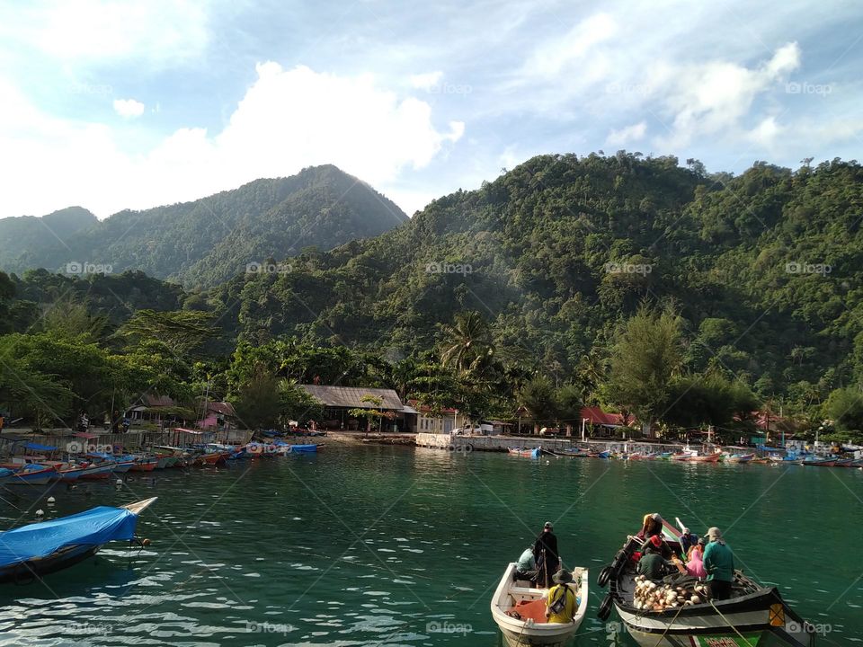 View of ships docked on the beach of Aceh, Indonesia.