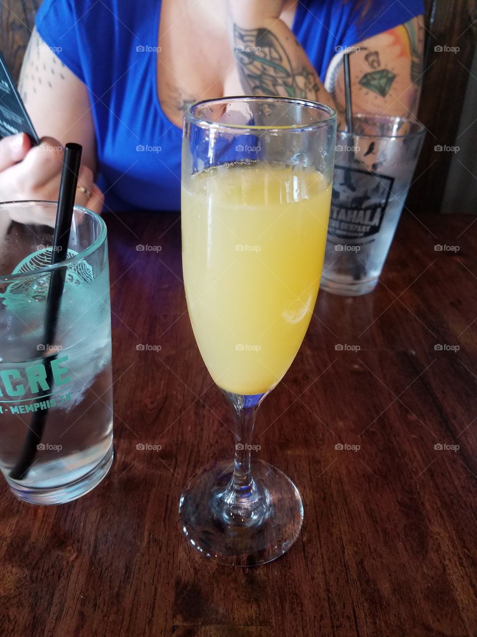 It's not brunch without mimosas. Just enough orange juice to scare the champagne.