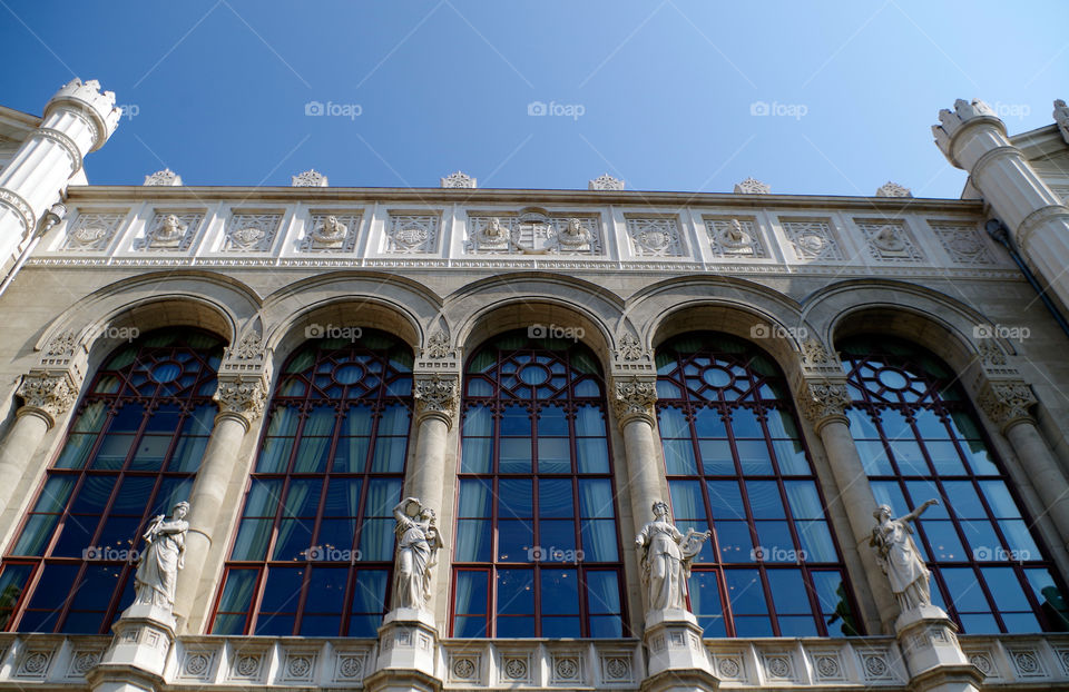 Low angle view of building against blue sky.