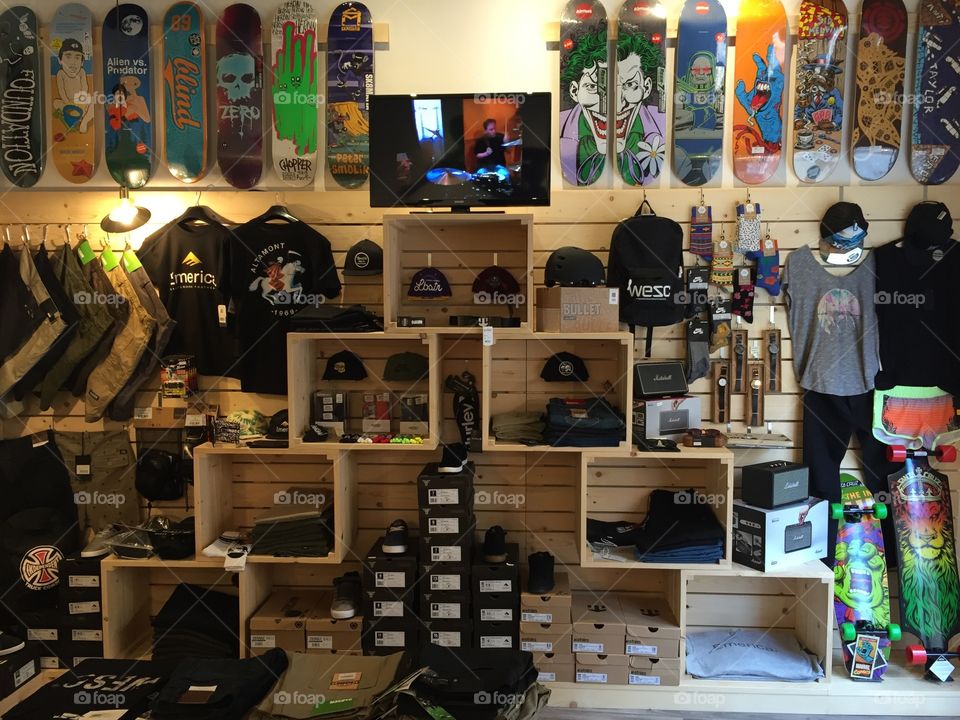 The wall full of things in the SkateShop,Ollie trick