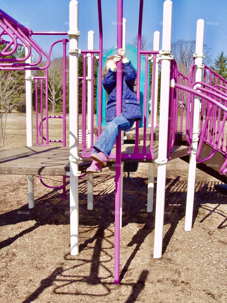 Girl on the purple playground 