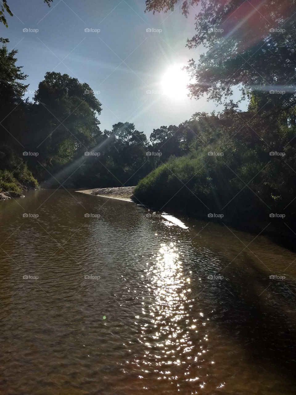 Sandy spit by some water