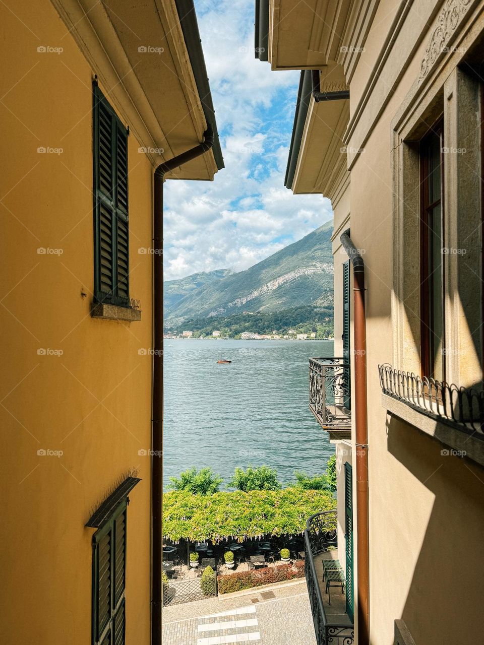 Beautiful view of a boat touring Lake Como Italy