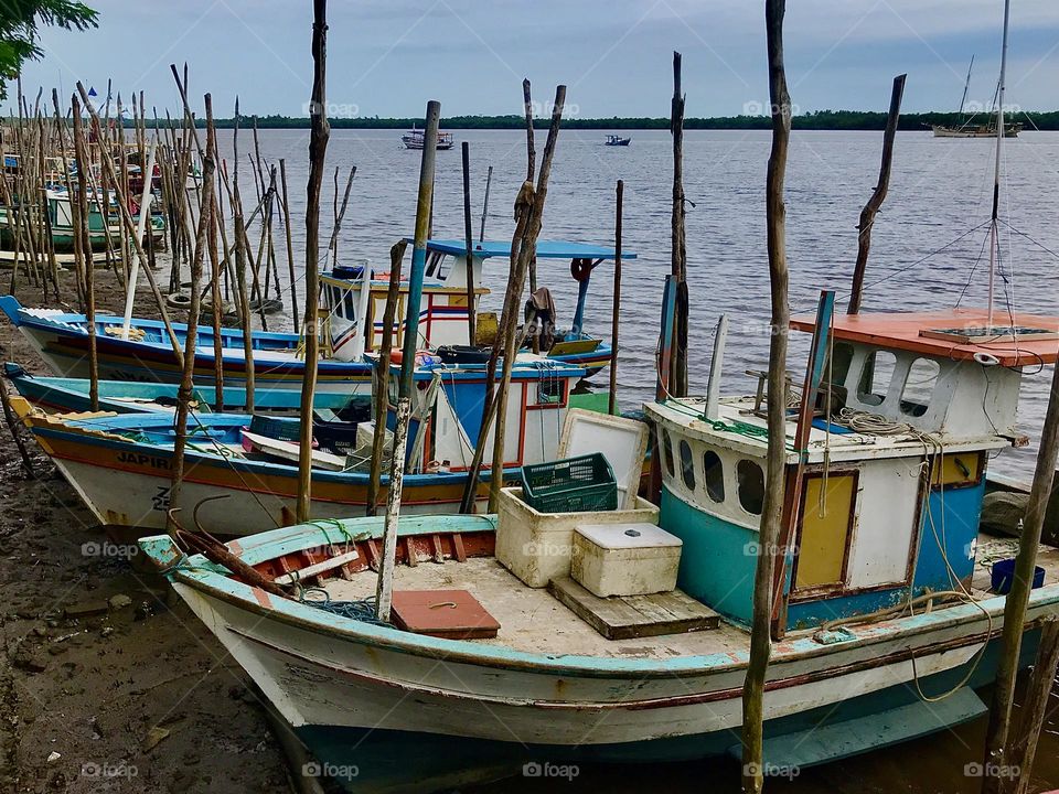 fishing boats moored at the port of Caravelas, Bahia