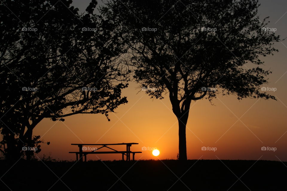 Picnic table at sunset