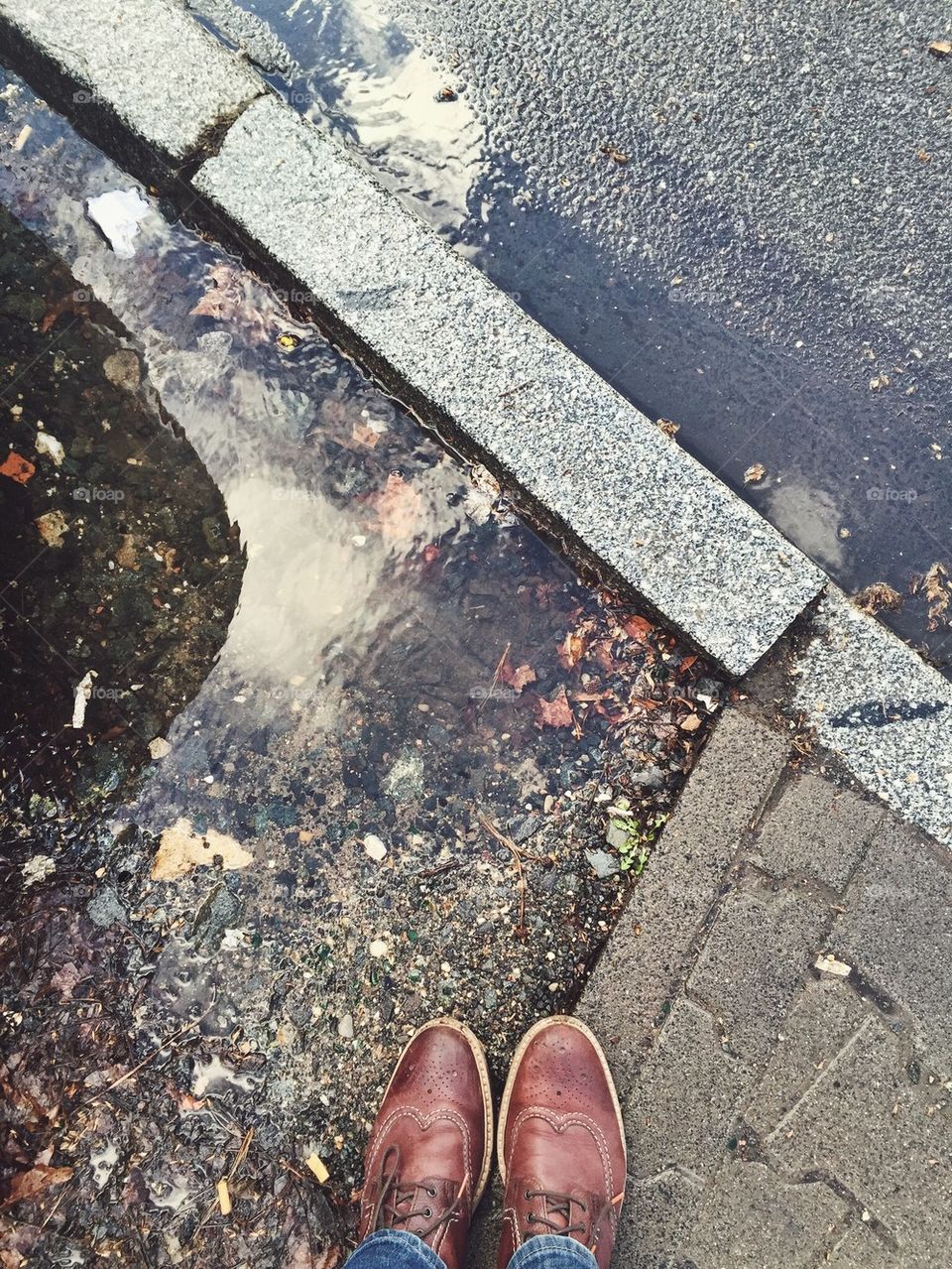 Big puddles on streets on a rainy day