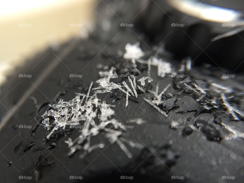 Snowflakes on a camera lens