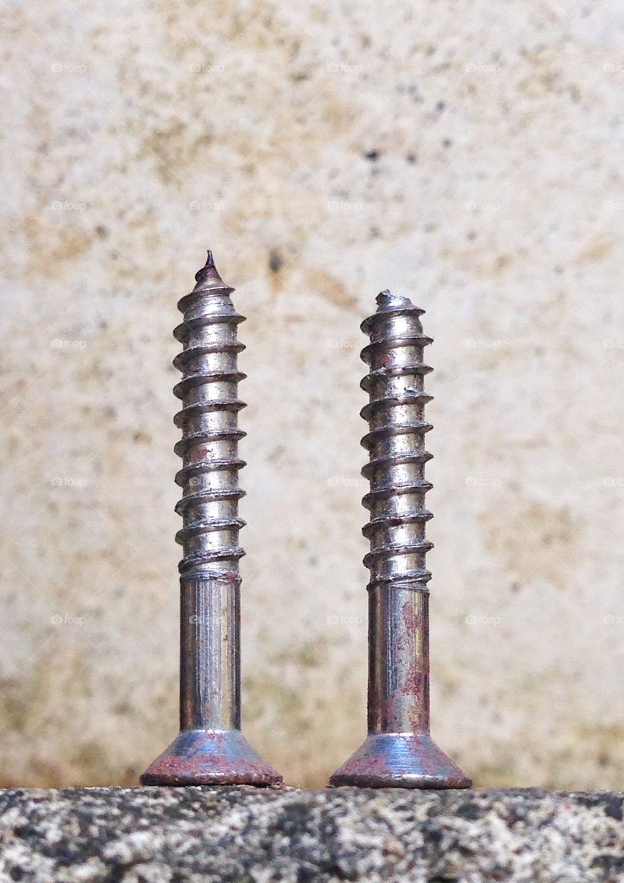 This two screw could represent the two towers that was attacked some 7 years ago. 