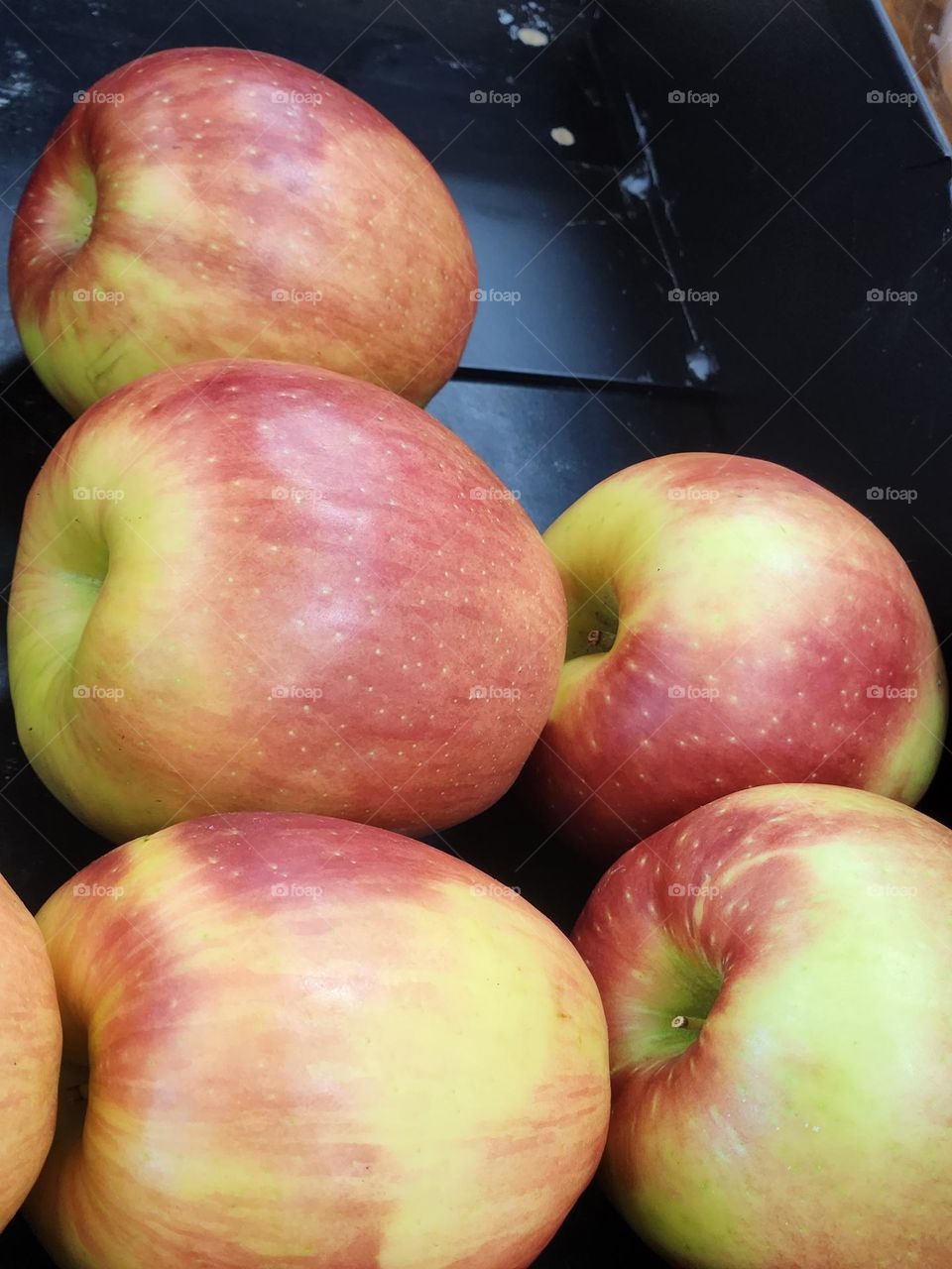 selection of apples at a local market