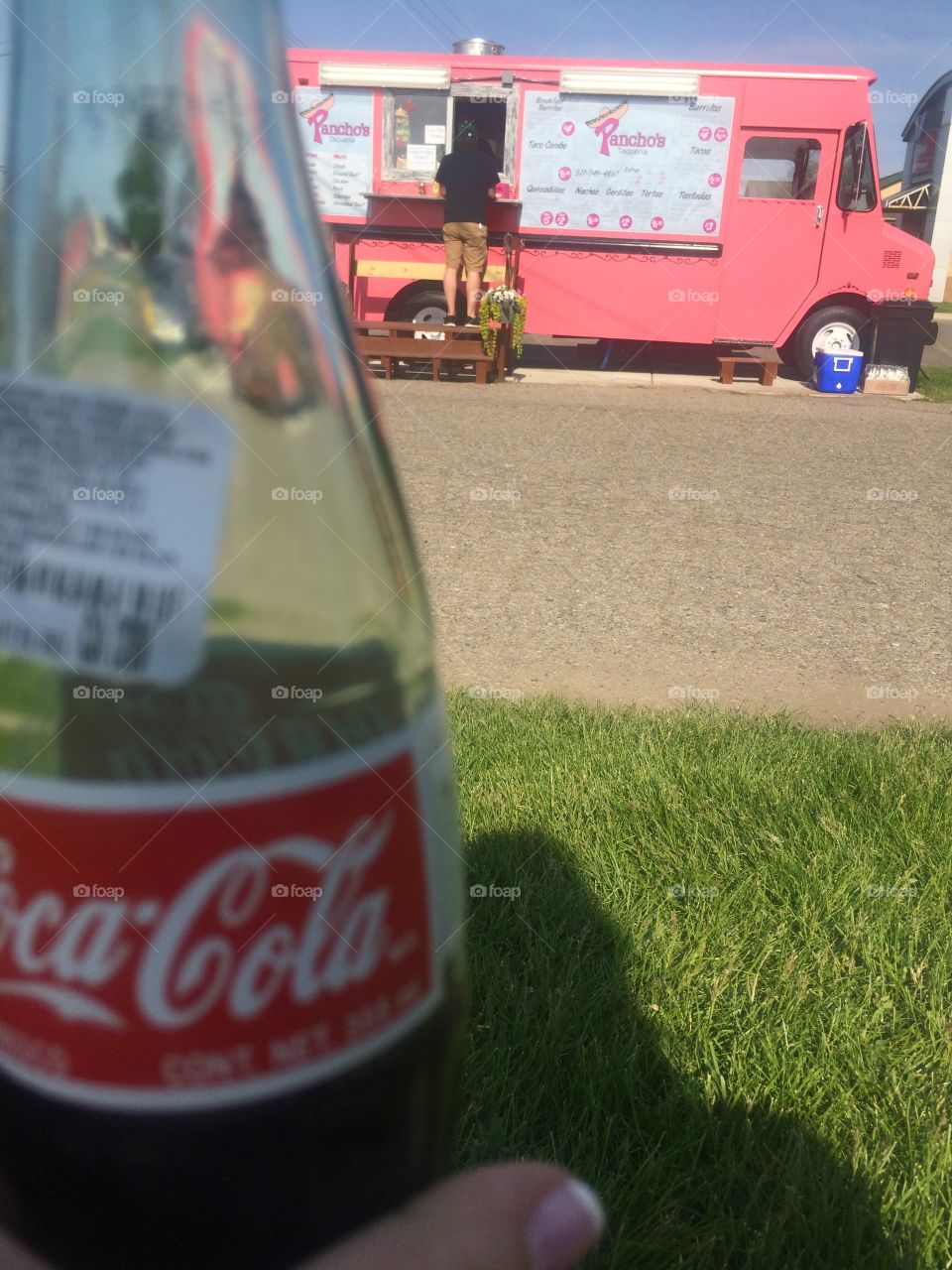 Coca Cola bottle and a food truck