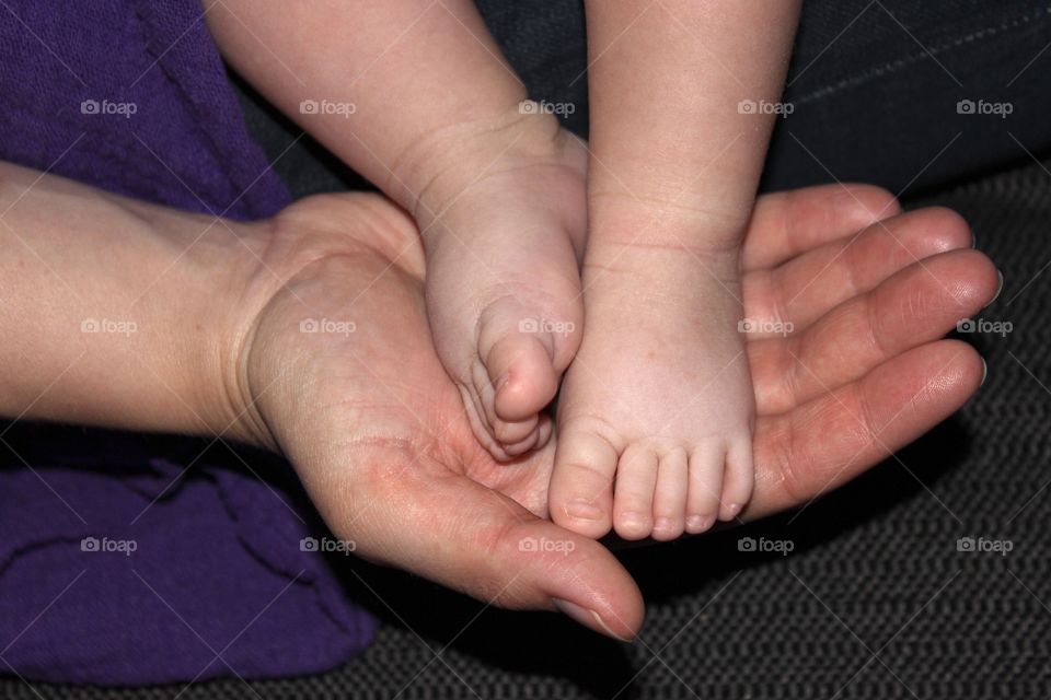 The small feet of a newborn baby is absolutely adorable