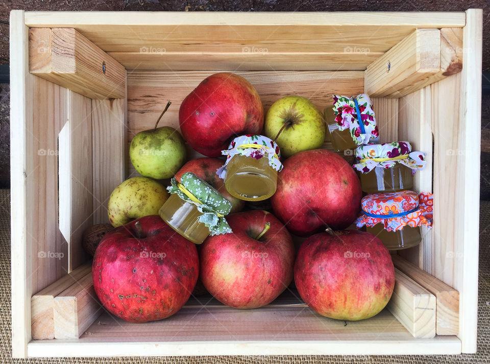Autumn apples and bee honey at the farmer's market 