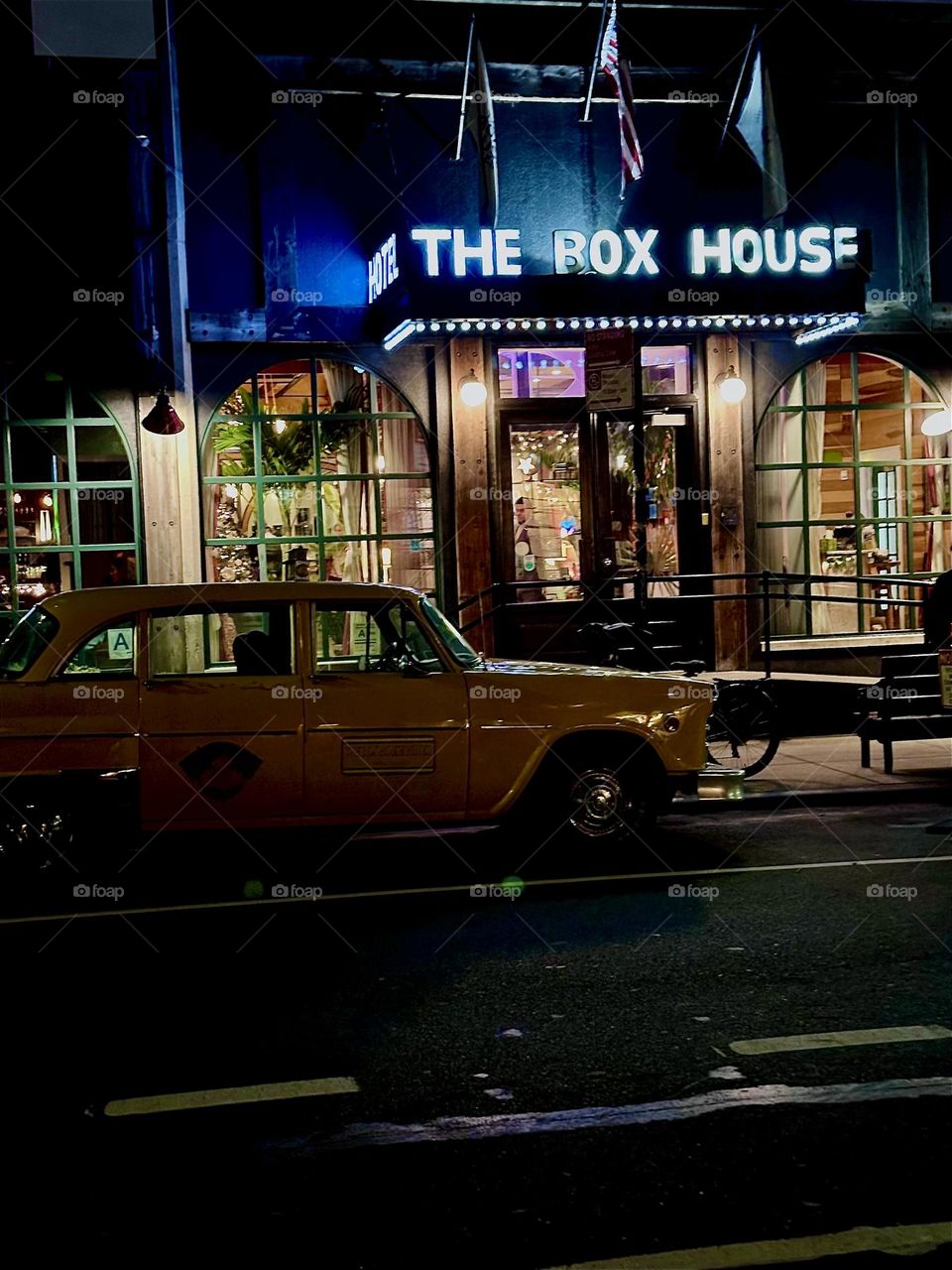 This is “THE BOX HOUSE HOTEL” on “Box Street” in “Greenpoint”, Bklyn by the “Pulaski Bridge”. The lit up awning invites guests to stay here and there is usually at least one yellow cab parked up front by the lobby. 2023. Hypnotic Productions
