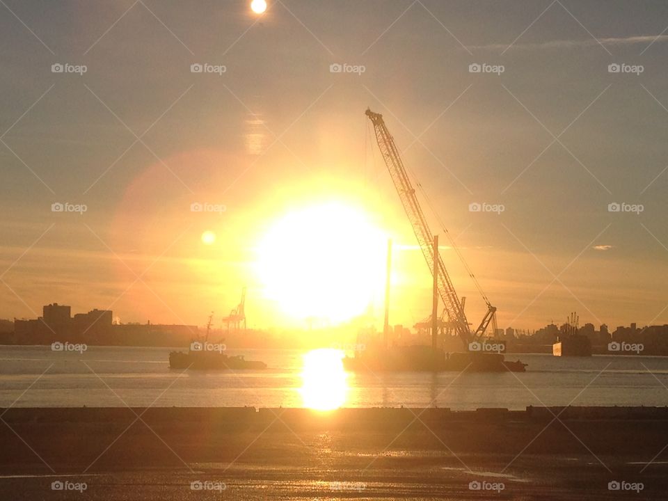 sunset on a tug and barge