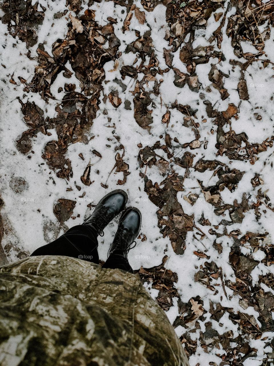 Walking in the winter forest, person in Marten boots