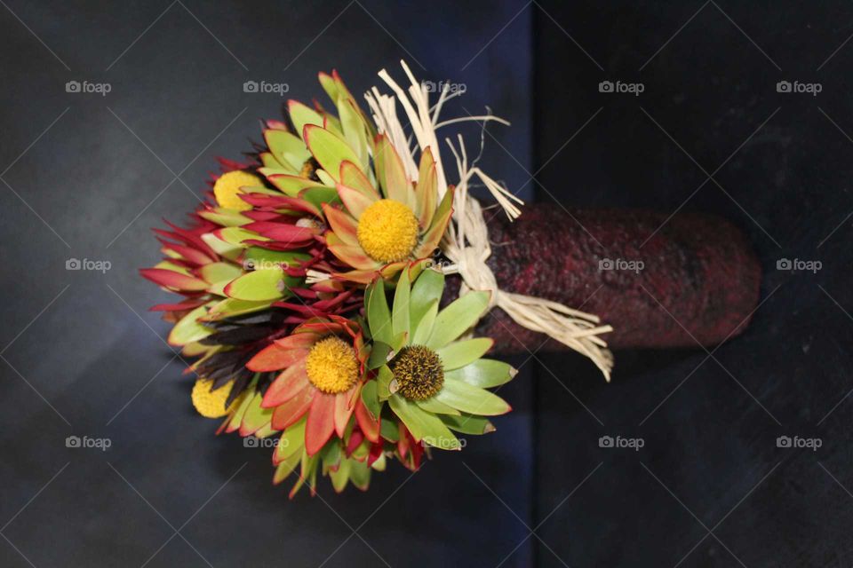 Vase of flowers in recycled glass