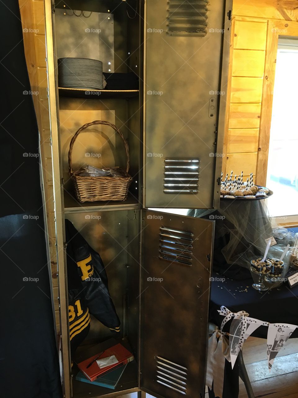 Old locker used to hold party plates, napkins and forks as well as props